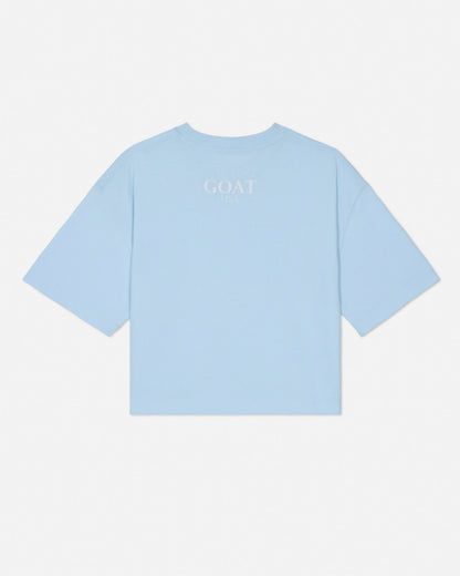 Light blue t-shirt with 'GOAT' text on a white background#color_delicate-blue