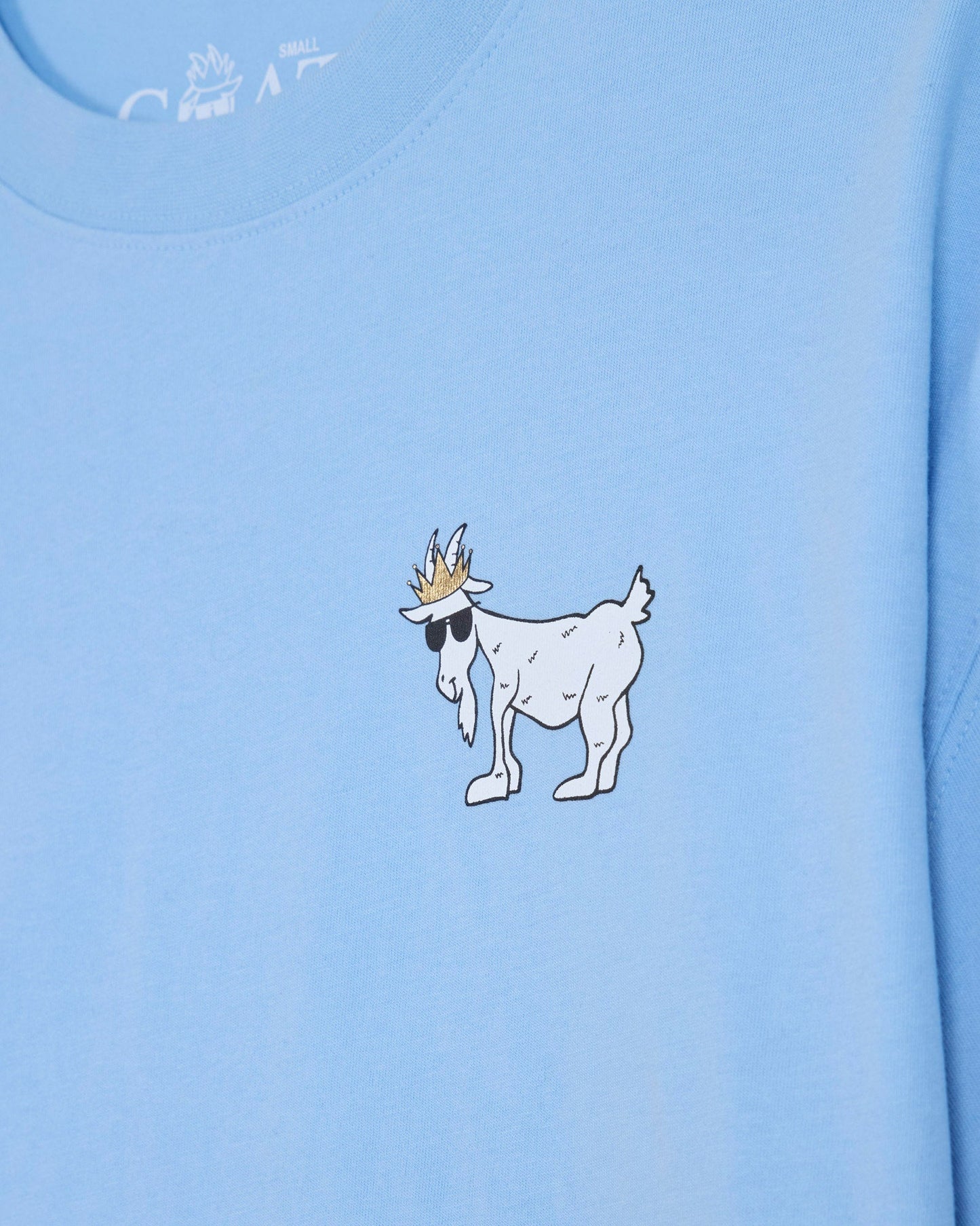 Close-up of carolina blue oversized crop top with white goat design#color_carolina-blue