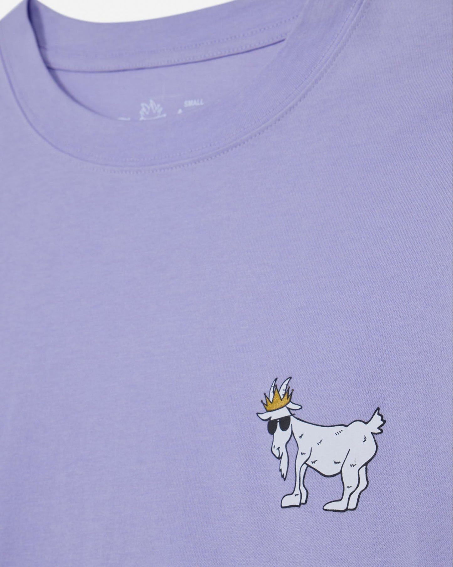 Purple t-shirt with a cartoon goat wearing a crown and sunglasses on the chest.#color_periwinkle