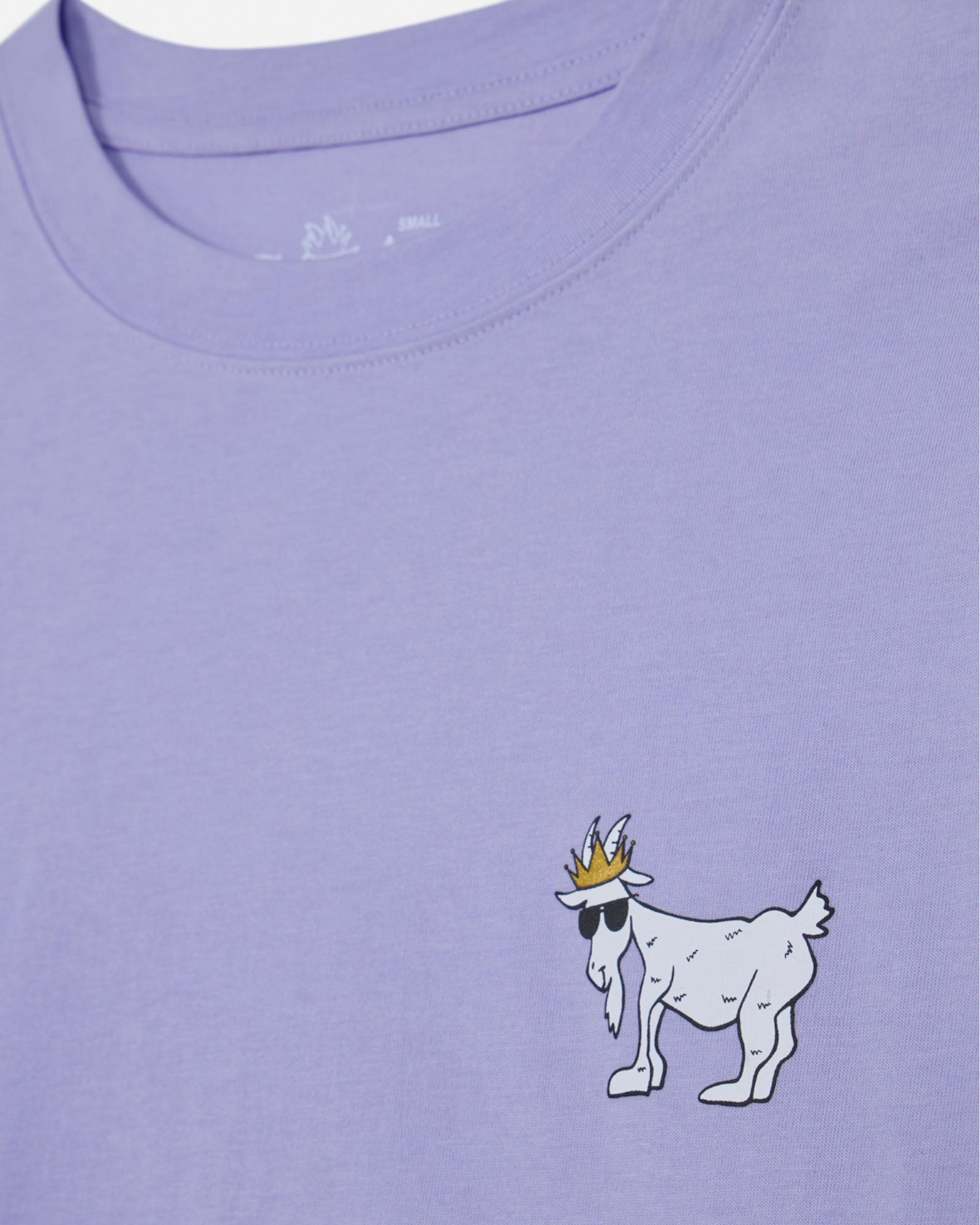 Purple t-shirt with a cartoon goat wearing a crown and sunglasses on the chest.#color_periwinkle