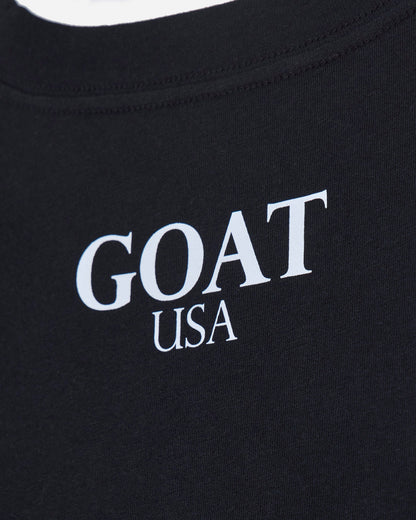 Close up of back of black oversized crop top with 'GOAT USA' text#color_black