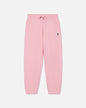 Pink sweatpants with a small logo on a light gray background#color_pink