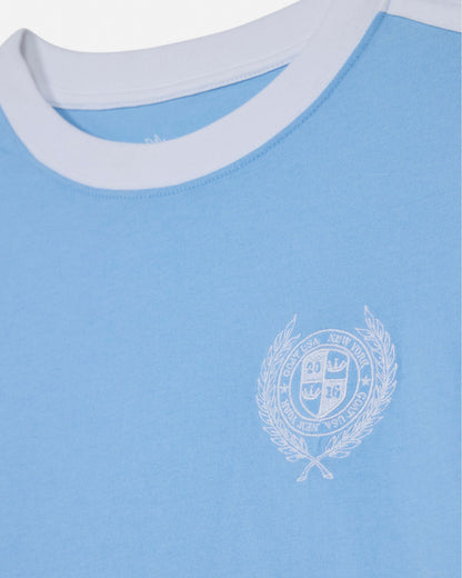 Light blue shirt with a white emblem on a white background#color_carolina-blue