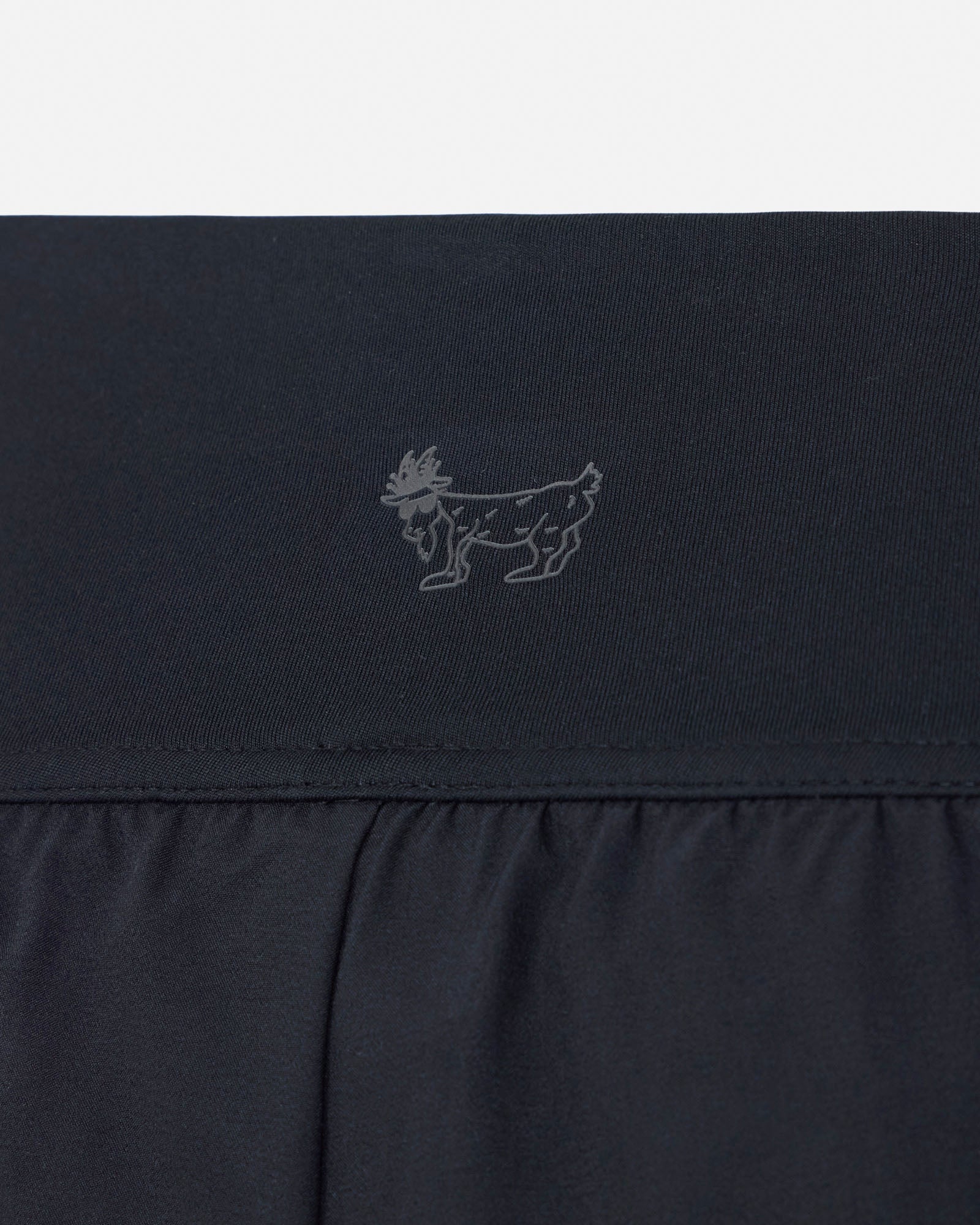 Black fabric with a small logo on a white background#color_black