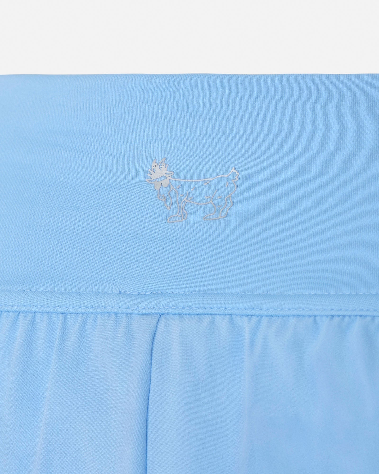 Light blue short with a subtle logo on a white background#color_carolina-blue