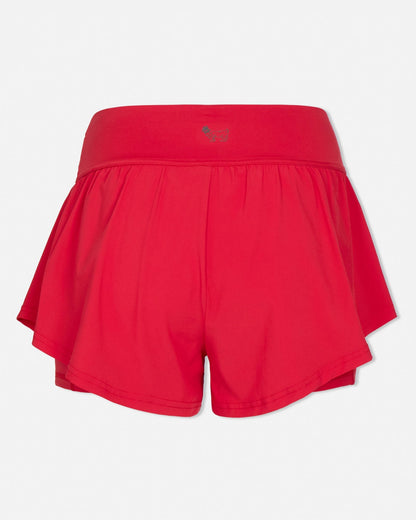 Red athletic shorts on a light gray background#color_poinsettia