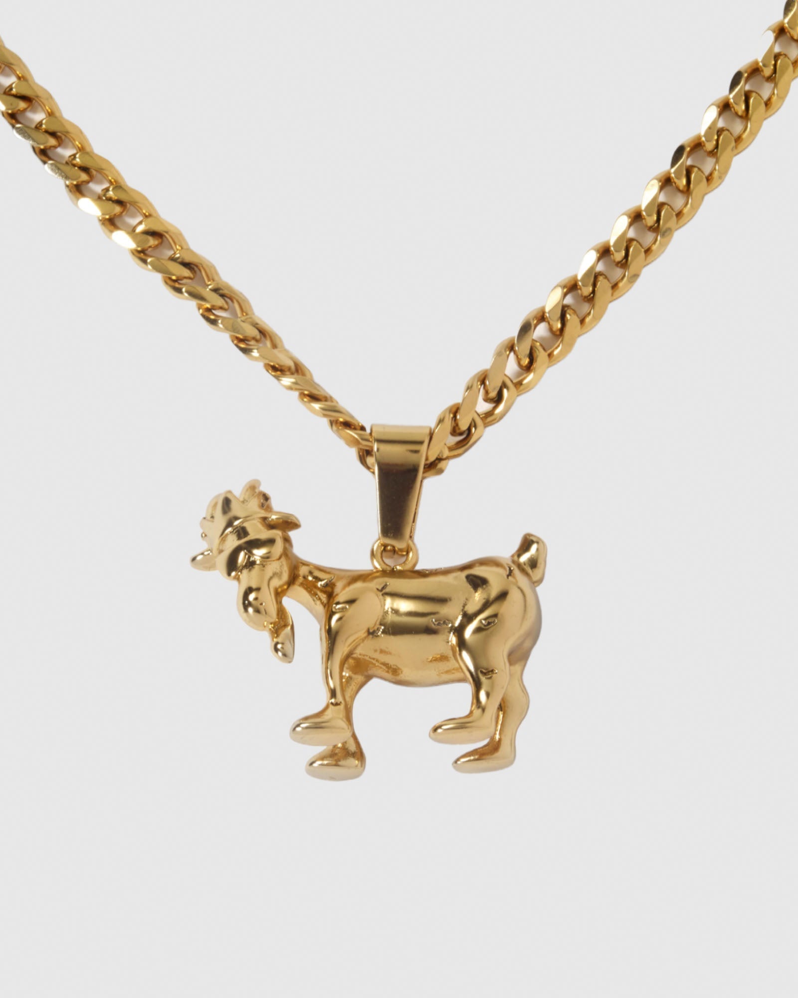 Gold Goat pendant on chain