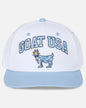 Head-on shot of white flat brim with "GOAT USA" text and Chuck the GOAT
