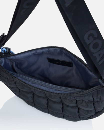 Inside pouch of black sling bag