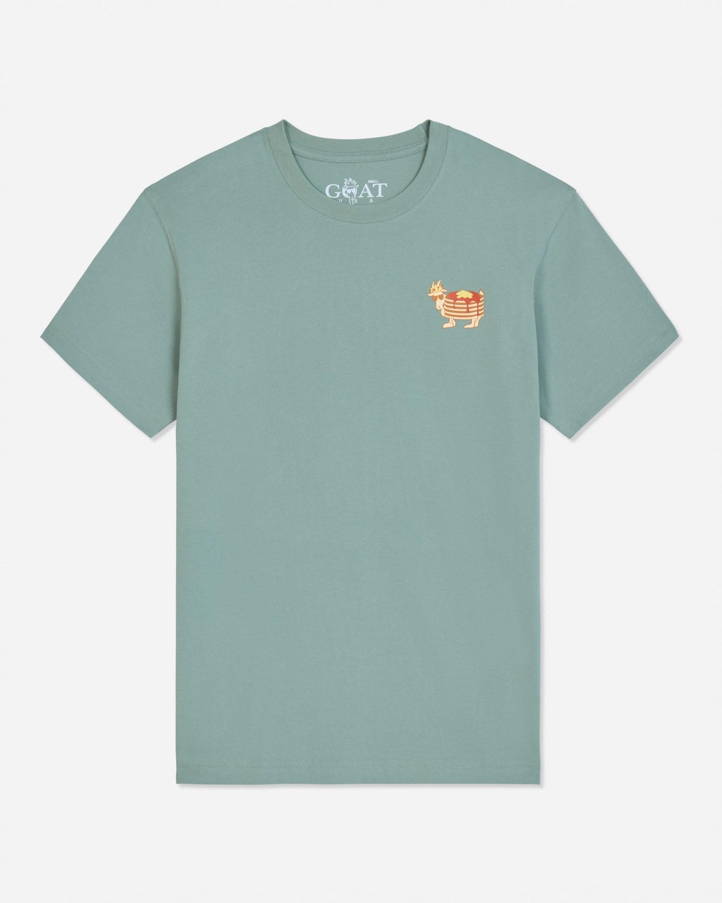 A sage green short-sleeve t-shirt featuring a small embroidered goat logo on the left chest in orange and white.