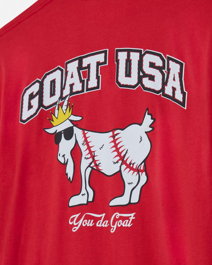 Red t-shirt with 'GOAT USA' and goat graphic design on a plain background
