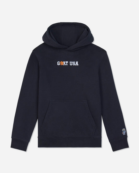 A black pullover hoodie with 'GOAT USA' printed across the chest in white and orange, and a small Goats Head logo on the left sleeve cuff, shown against a light gray background.