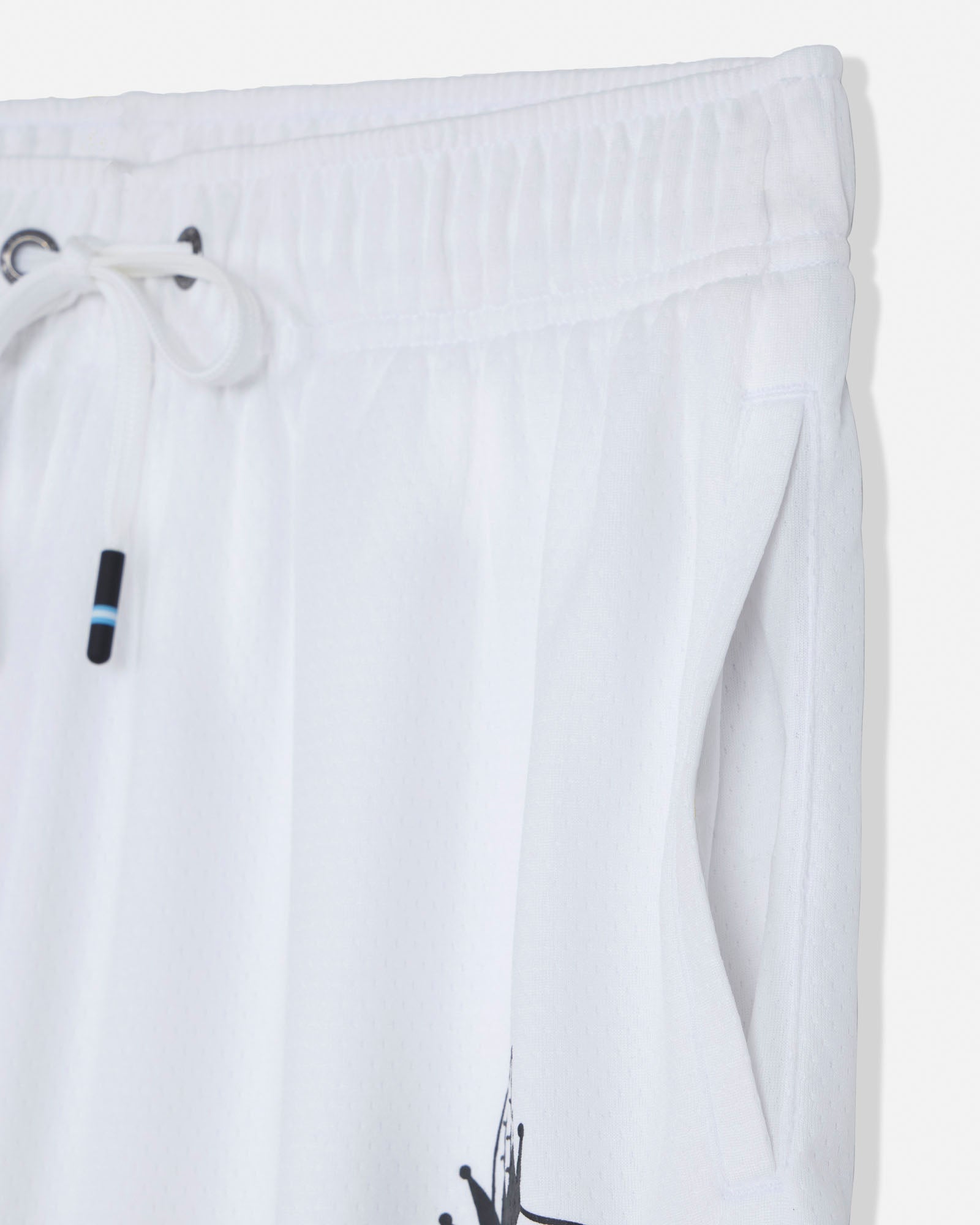 White shorts with a black logo on a white background#color_white