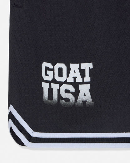 Close-up of 'GOAT USA' text n black shorts#color_black