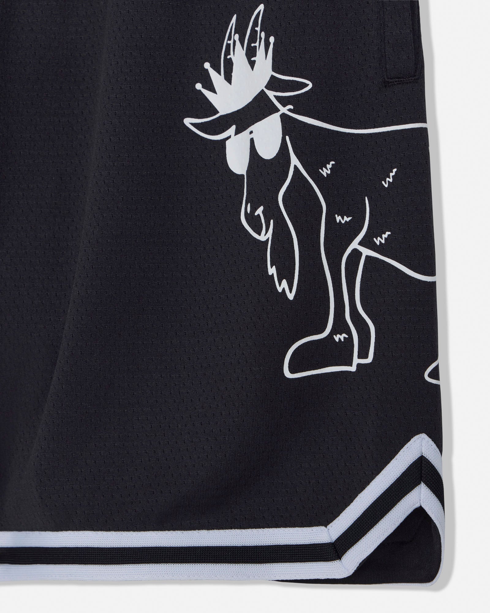 Close-up of goat logo on black shorts#color_black