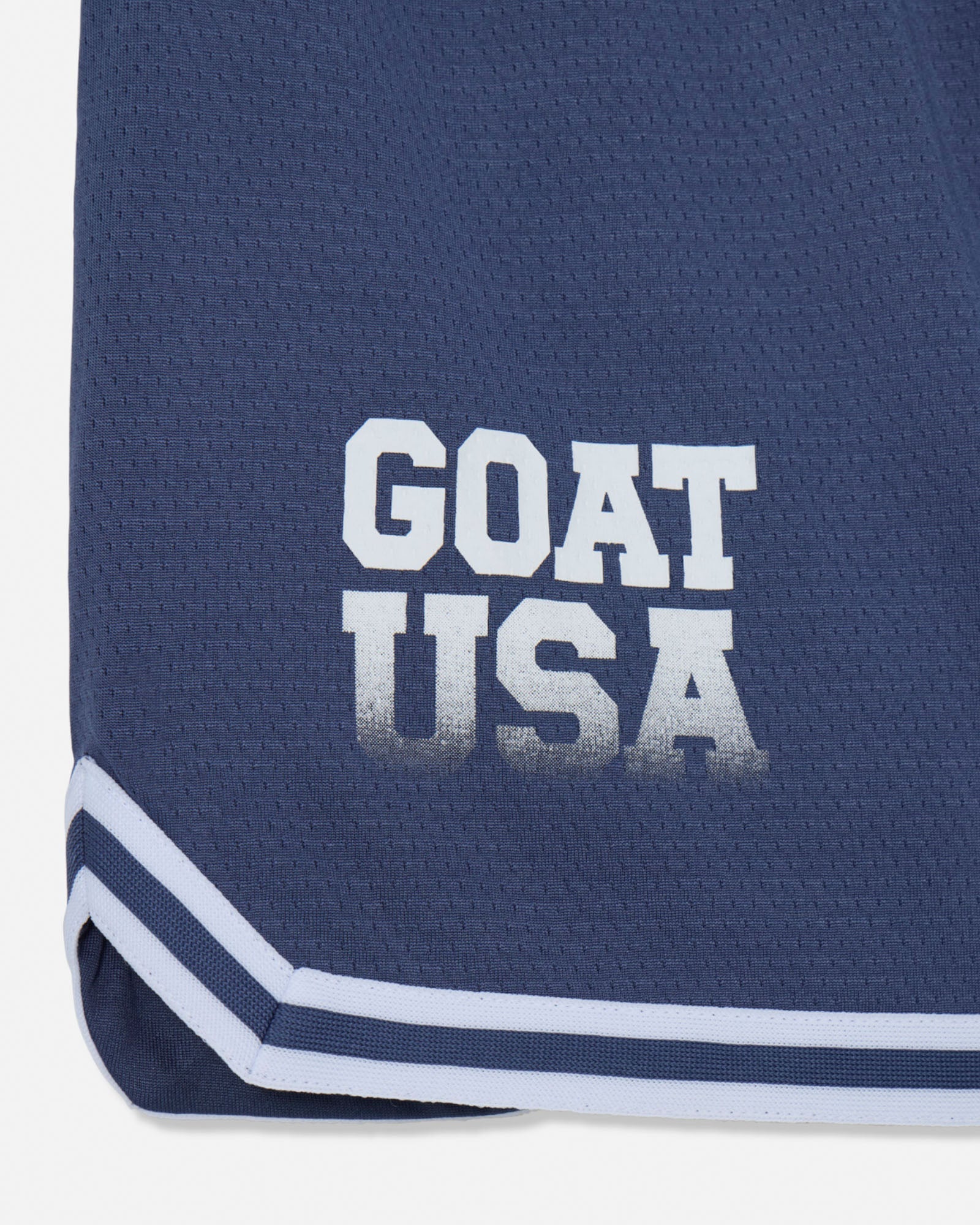 Close-up of "GOAT USA" text on navy mesh#color_navy