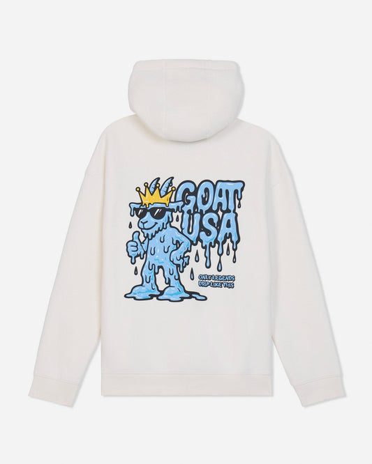 An off-white hooded sweatshirt shown from the back, featuring a large graphic print of a melting blue cartoon character wearing sunglasses and a gold crown next to the text 'GOAT USA'.