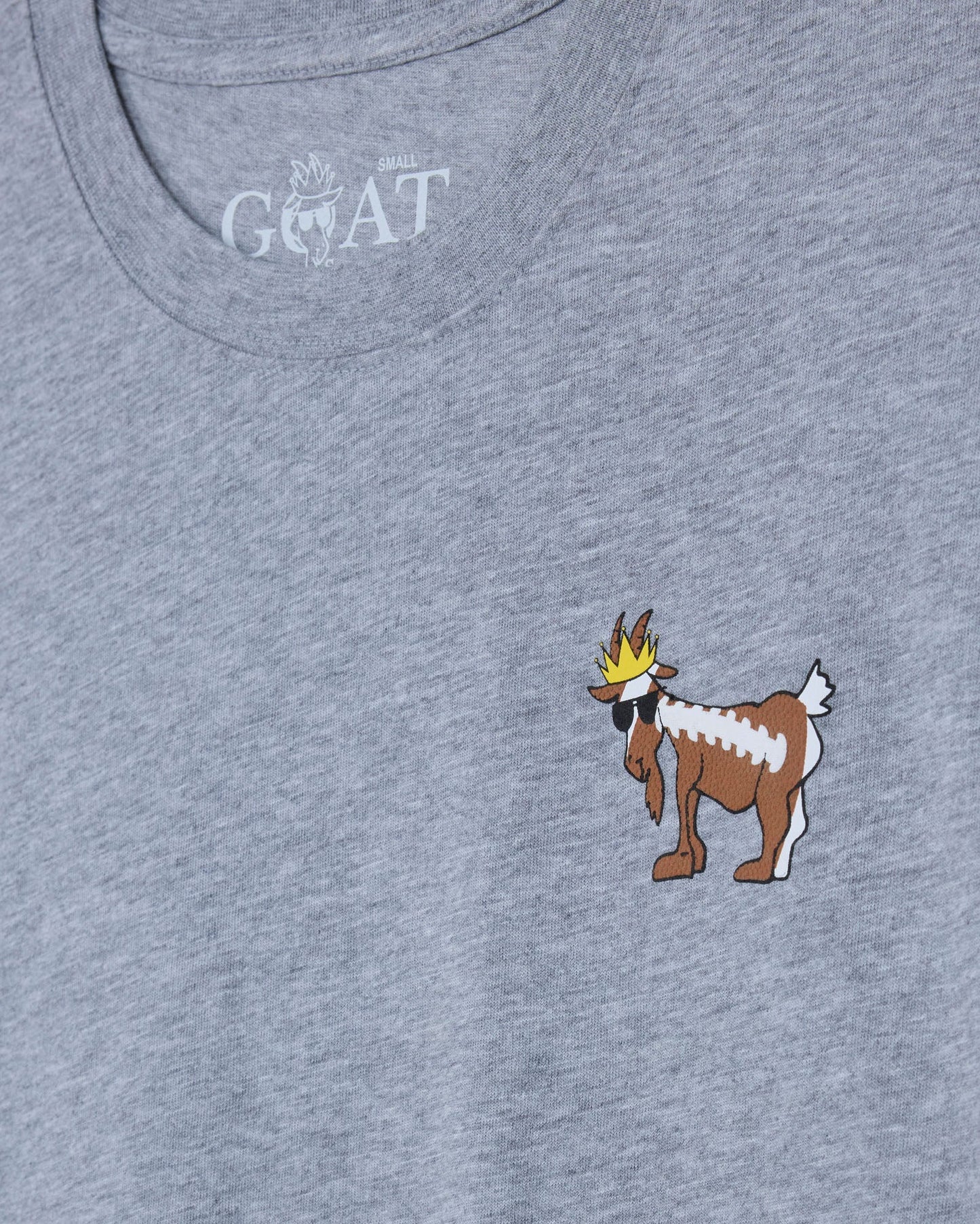 Gray t-shirt with a cartoon goat design and 'GOAT' text on a gray background