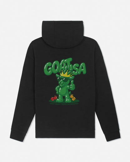 A black pullover hoodie shown from the back, featuring a large green graphic of a cartoon character wearing a gold crown and the word 'GOAT USA' in bold green letters above it.