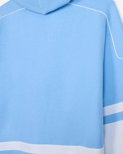 Close-up of back of light blue and white hoodie
