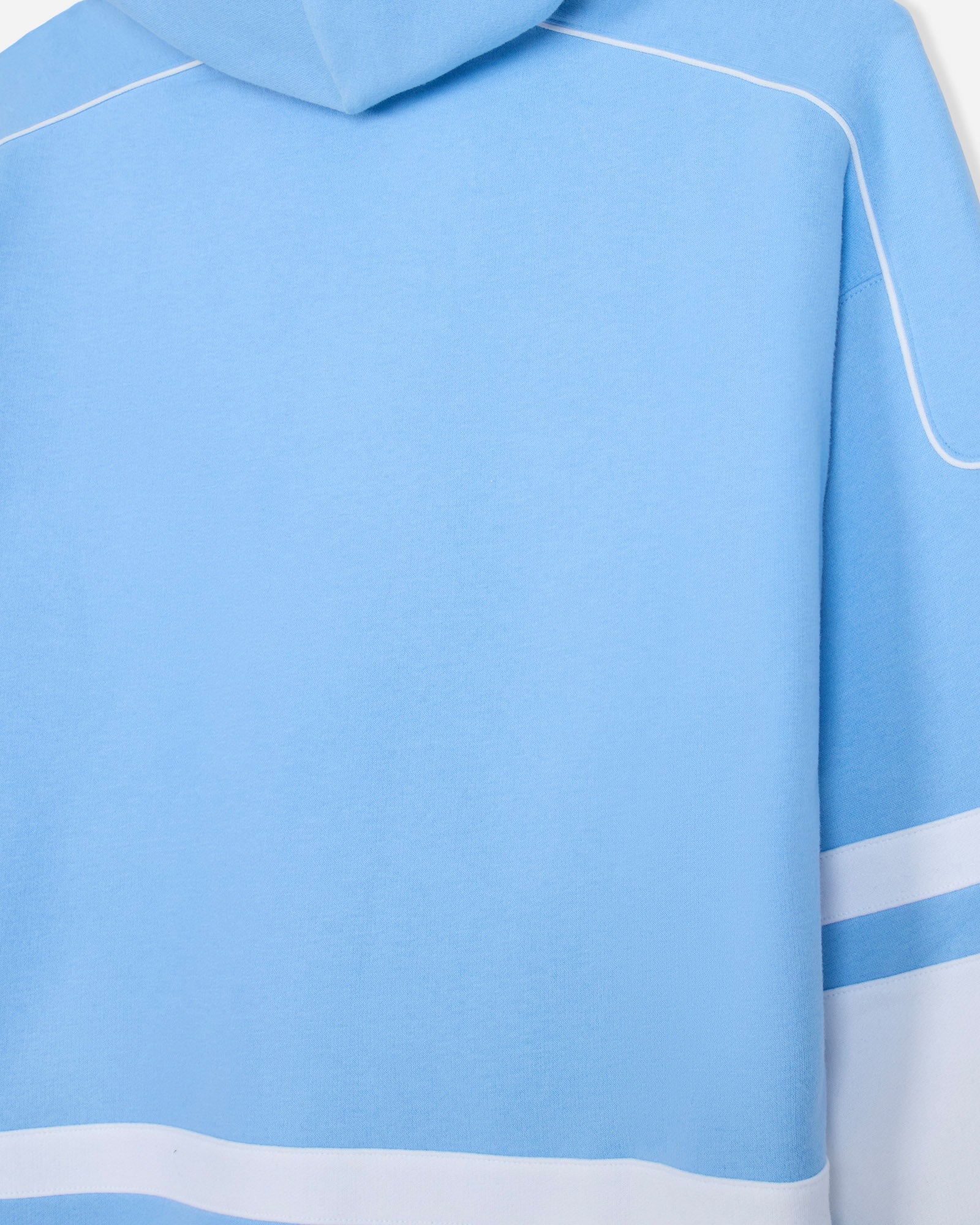Close-up of back of light blue and white hoodie