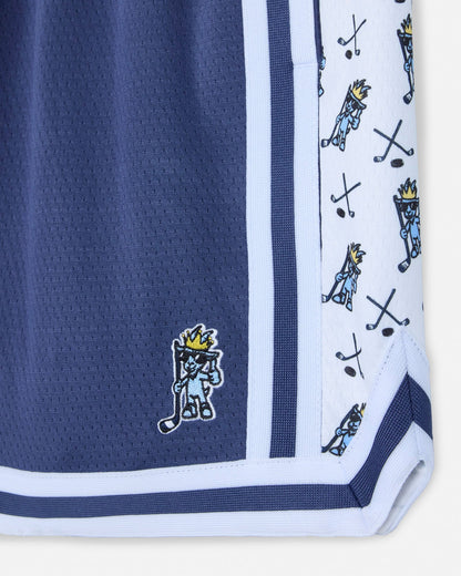 Navy blue mesh shorts with logo and pattern.