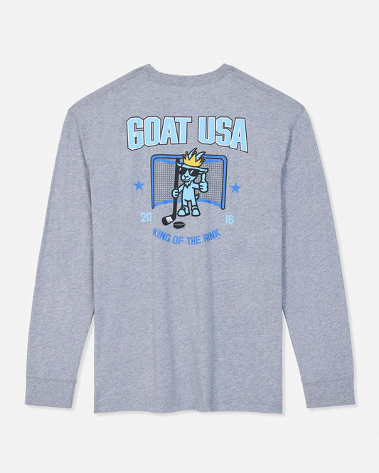 A heather gray long-sleeve t-shirt with a blue and white graphic on the front featuring a cartoon goat mascot in front of a hockey goal, with the text 'GOAT USA' and 'KING OF THE RINK'.