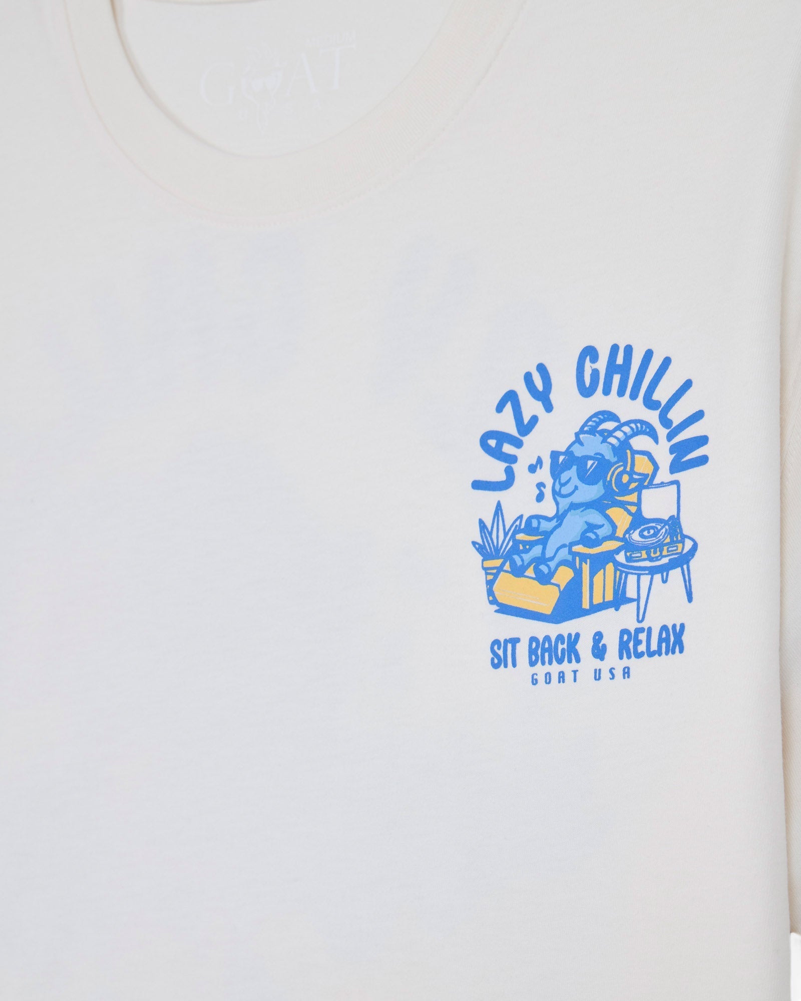 Bone t-shirt with goat sitting back and listening to music left-chest graphic