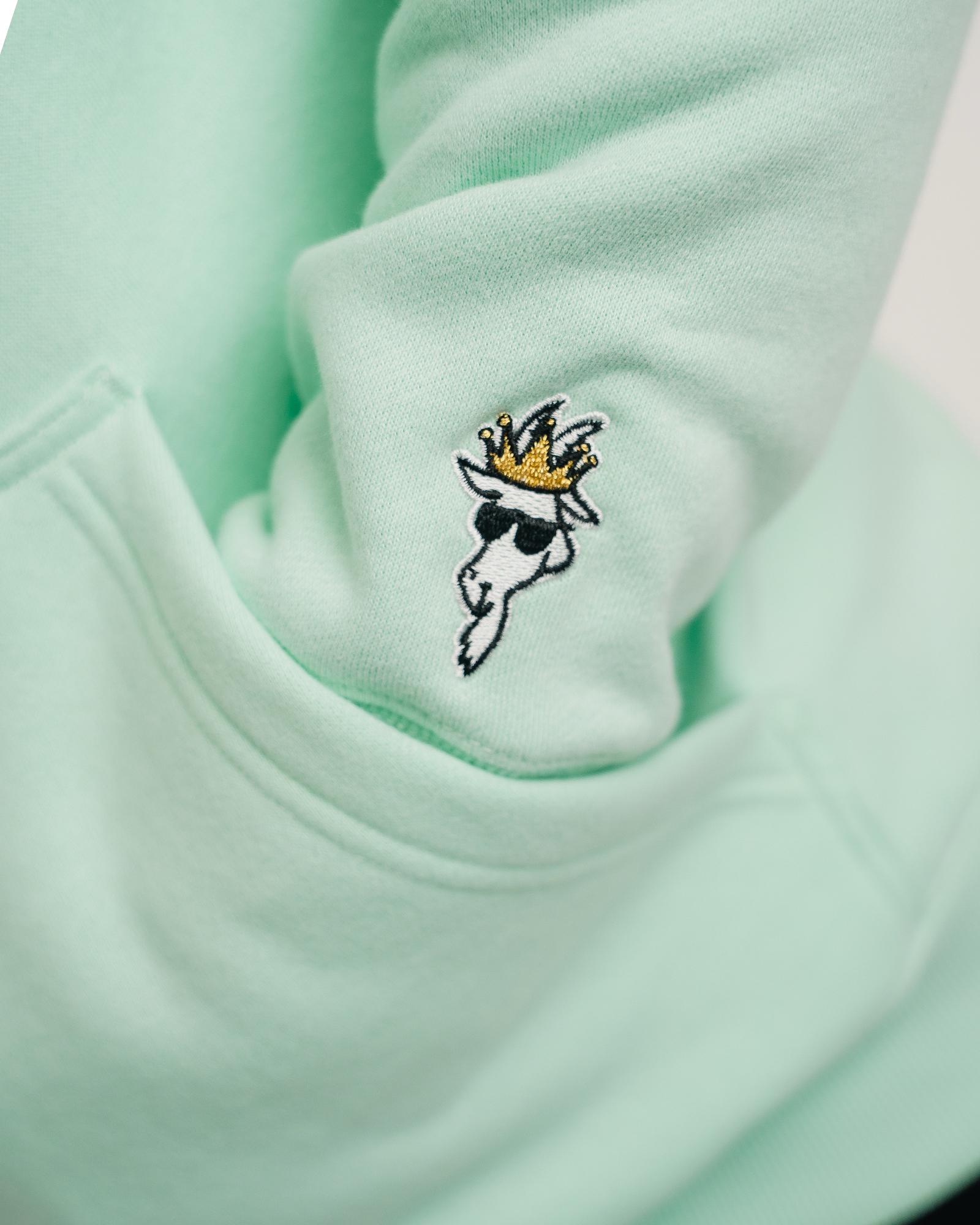 Close-up of sleeve embroidery logo mint WG Hooded Sweatshirt#color_mint
