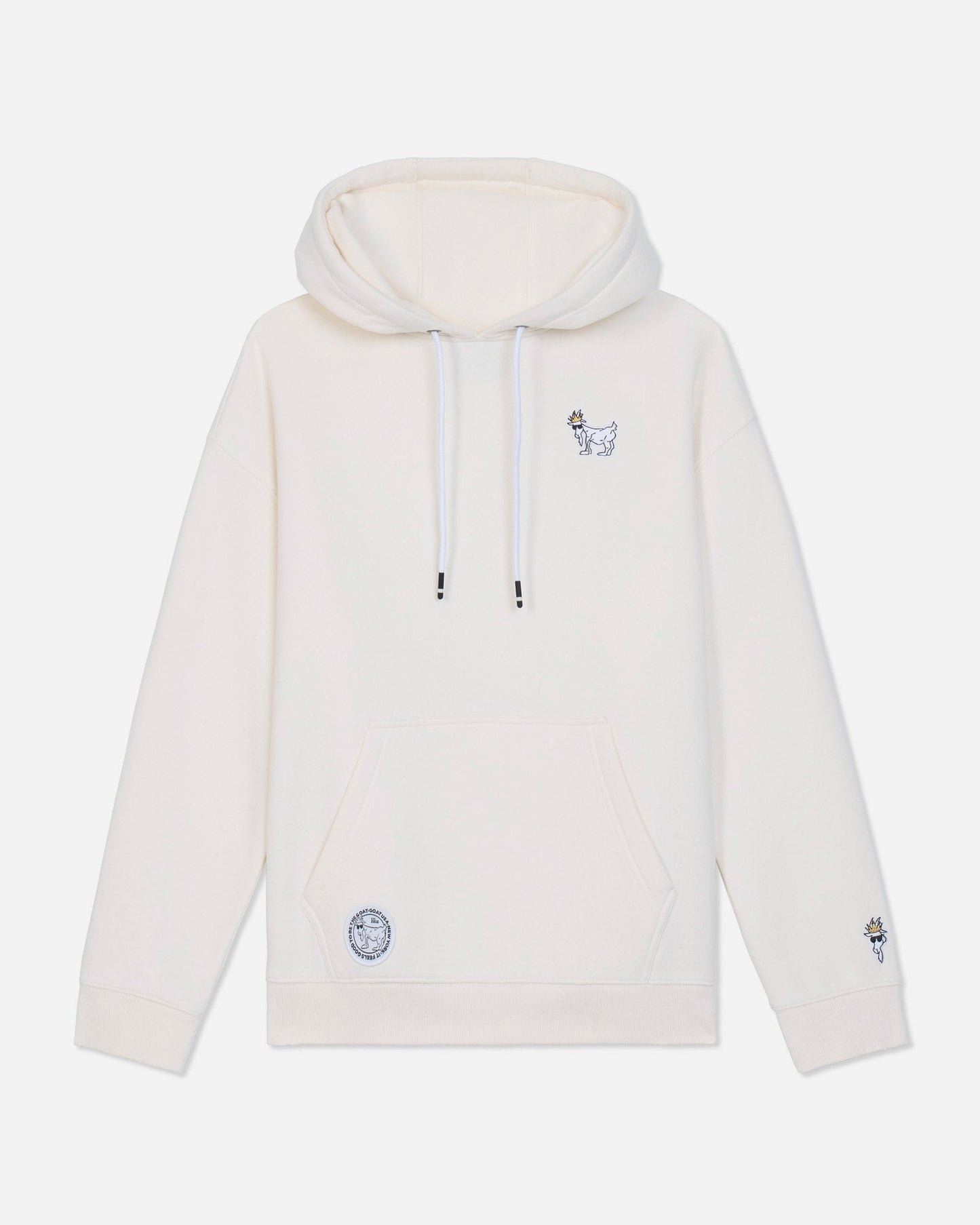 An off-white pullover hoodie with white drawstrings, featuring a small embroidered character on the left chest and a circular patch on the lower left front pocket, shown against a light gray background.#color_bone