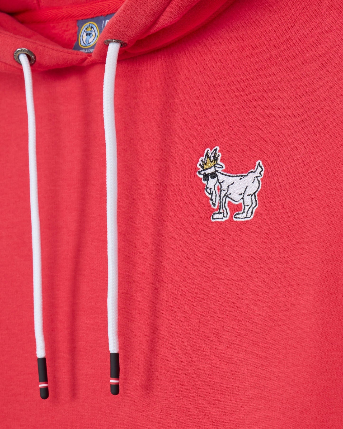 Red hoodie with a small white logo on the chest#color_poinsettia