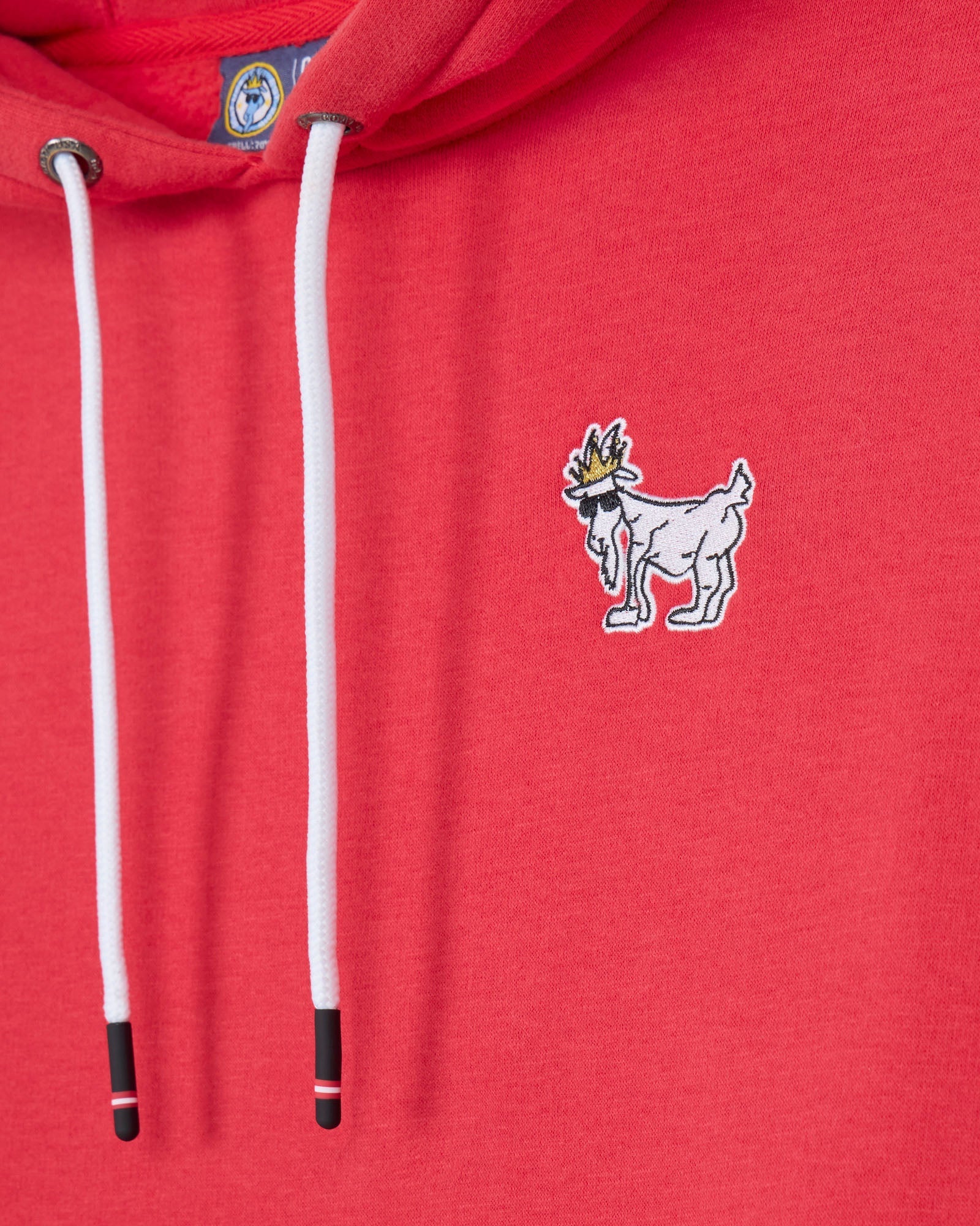 Red hoodie with a small white logo on the chest#color_poinsettia