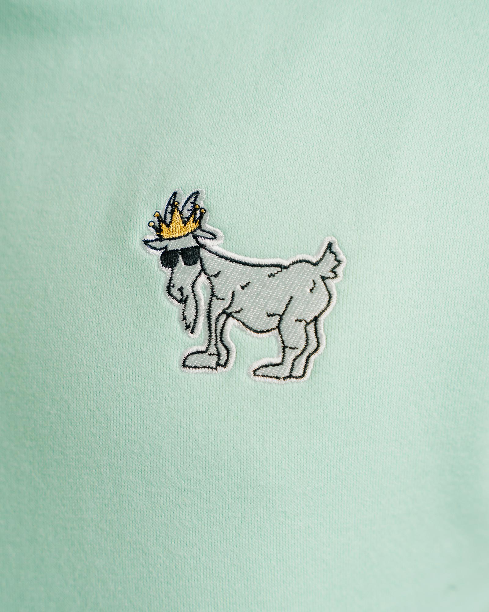 Close-up of logo on mint WG Hooded Sweatshirt#color_mint