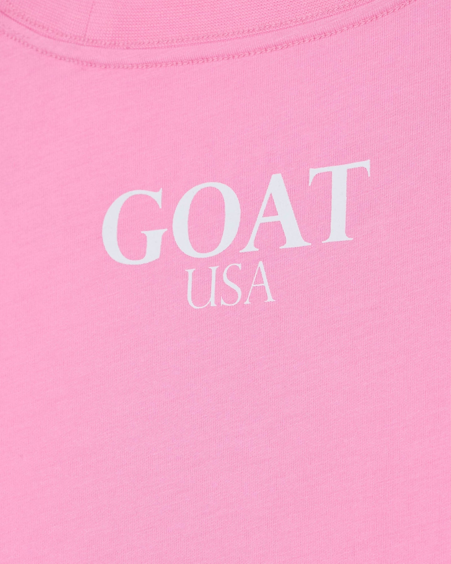 Pink t-shirt with 'GOAT USA' text in white#color_paradise-pink
