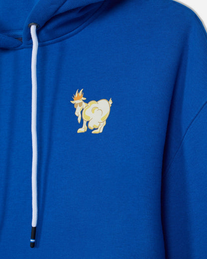 Close-up of a bright blue hoodie featuring a small embroidered cartoon goat character on the left chest and a white drawstring.