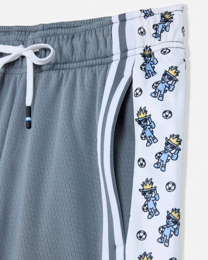Gray shorts with a white side strip featuring cartoon characters and soccer balls.