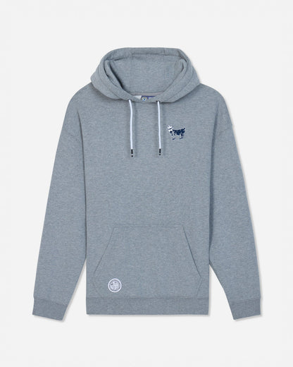 A heather gray hoodie with white drawstrings, featuring a small navy blue goat graphic on the left chest and a circular white logo patch on the lower left front pocket, displayed against a light gray background.#color_gray