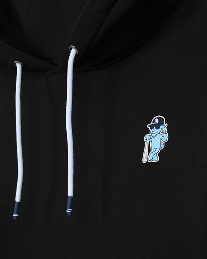 Close-up of a black hoodie featuring white drawstrings and a small light blue embroidered mascot logo on the chest.