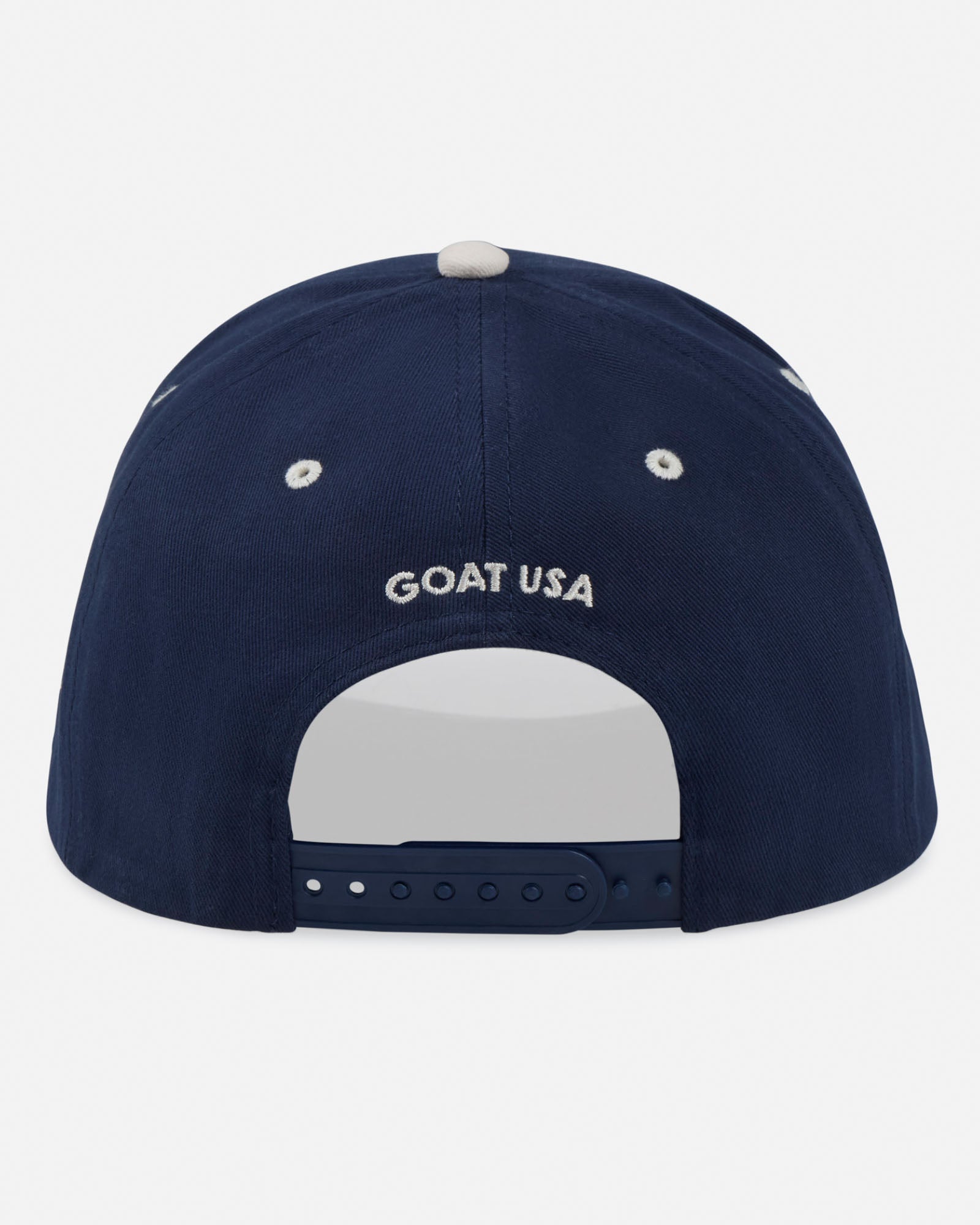 Navy blue cap with 'GOAT USA' logo on a white background