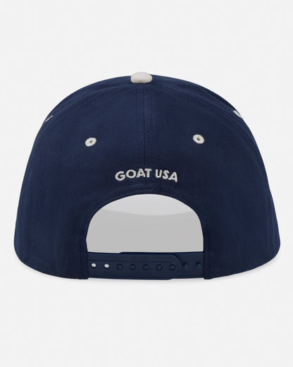 Navy blue cap with 'GOAT USA' logo on a white background
