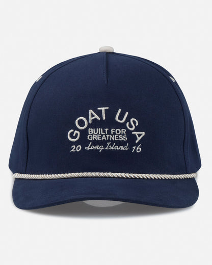 Navy blue cap with white text on a white background