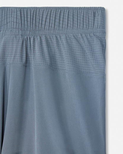 Close-up of gray shorts with a textured pattern on a white background#color_storm-gray