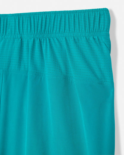 Teal shorts with an elastic waistband on a light gray background#color_jade