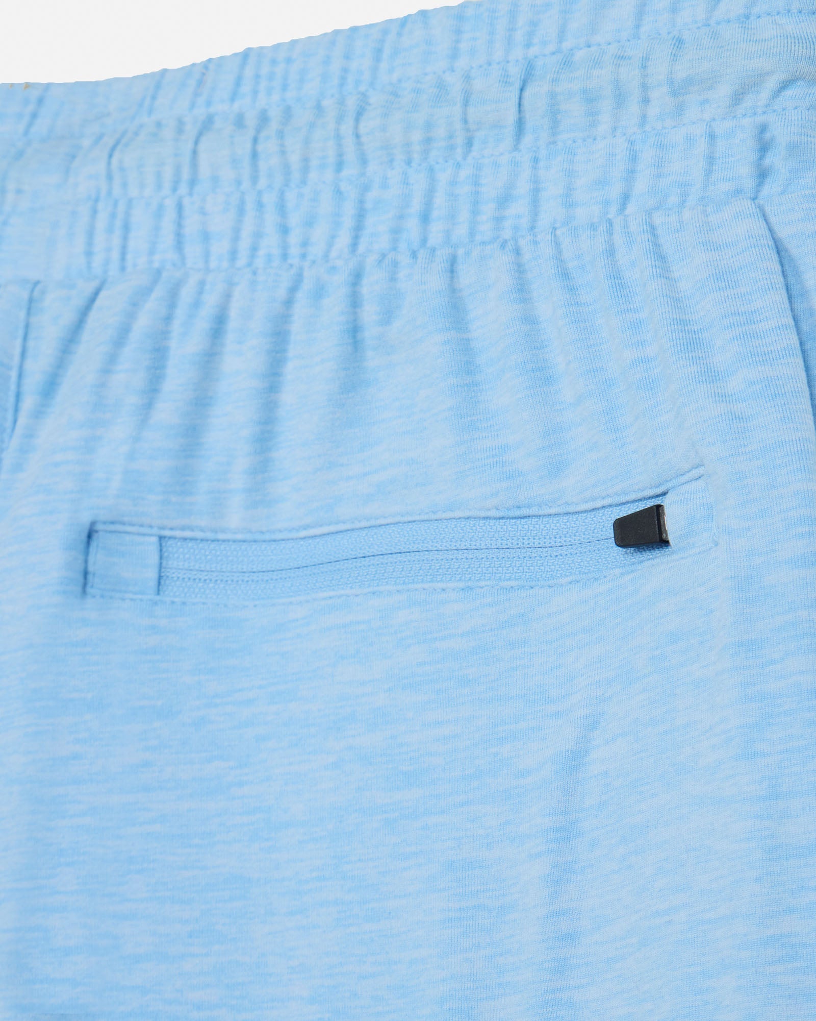 Close-up of blue shorts with a pocket detail#color_carolina-blue