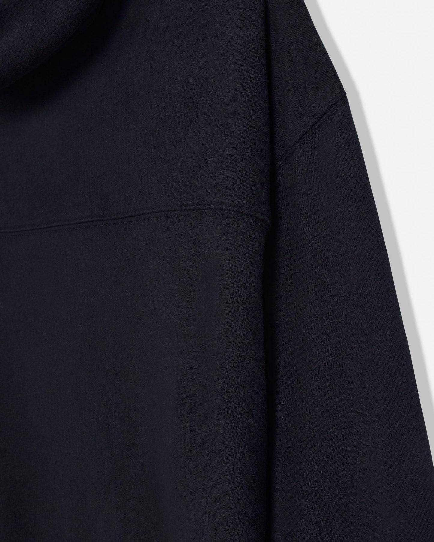 Close-up of a black fabric texture with a white background#color_black