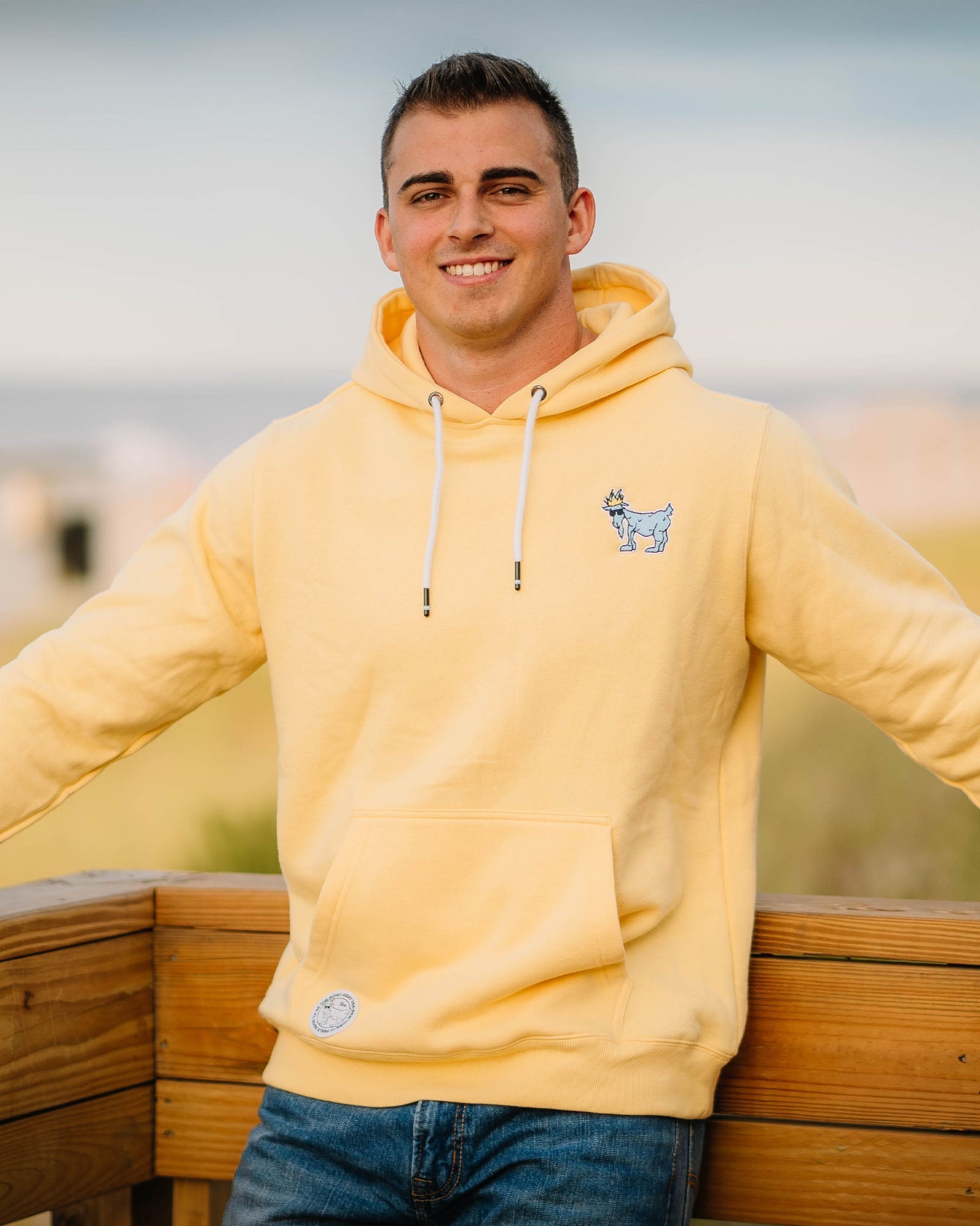 Model wearing banana cream OG Hooded Sweatshirt#color_banana-cream