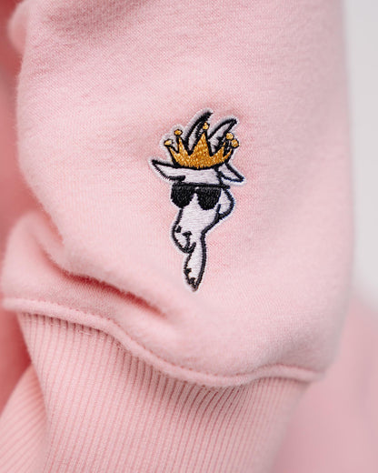 Close-up of sleeve logo embroidery on pink WG Hooded Sweatshirt#color_pink
