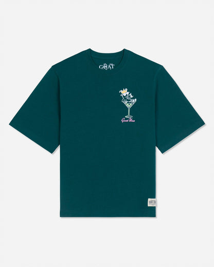 Front of sage t-shirt with martini glass goat left-chest logo