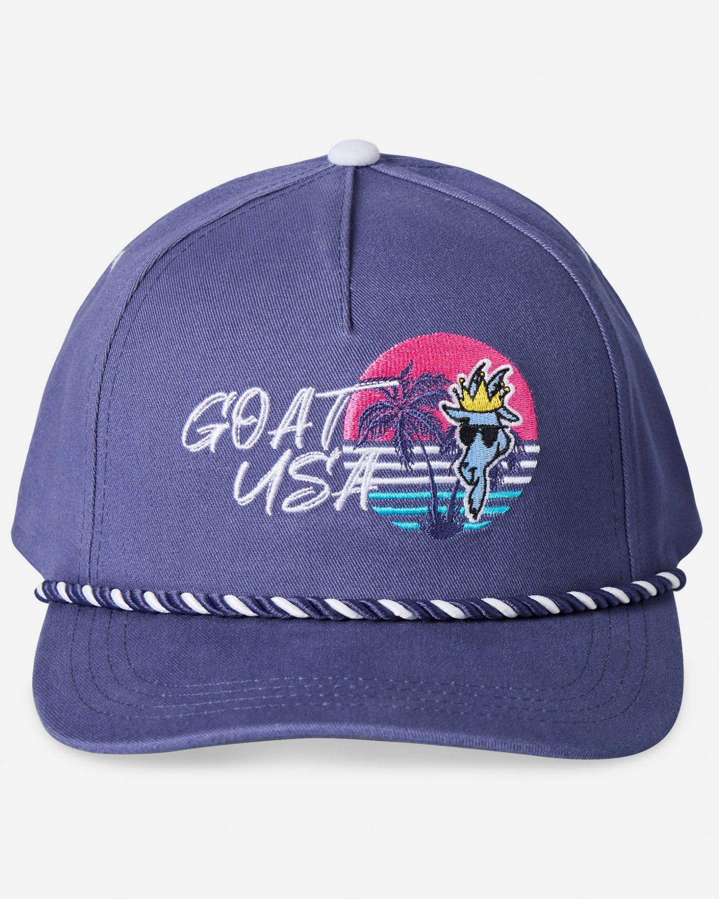 Head-on shot of navy hat with palm tree sunset graphic