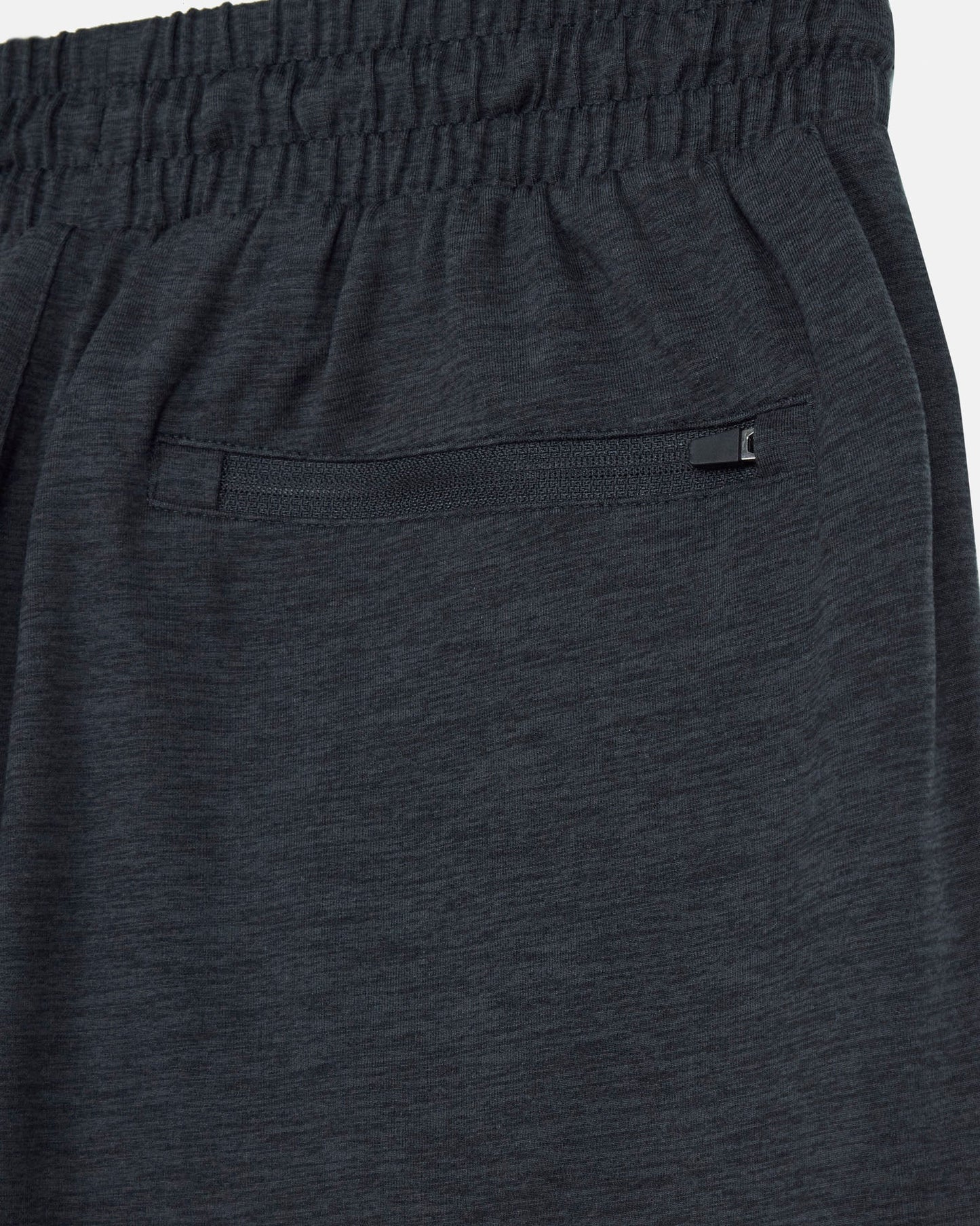 Dark gray sweatpants with a pocket detail on a light gray background#color_space-dye-black